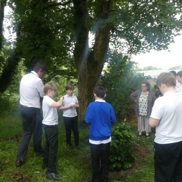 Our very first pupil planting a special Oak tree on the day he leaves us.