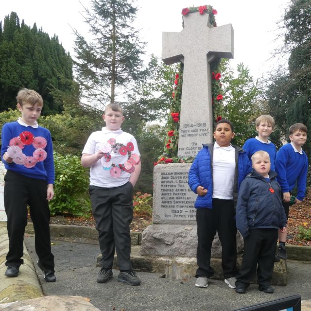 Bleasdale class paying their respects and placing handmade wreaths.
